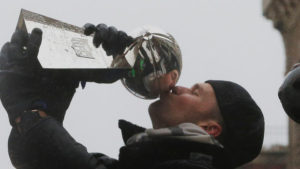 New England Patriots quarterback Tom Brady kisses one of the team's five Vince Lombardi trophies during their victory parade through the streets of Boston after winning Super Bowl LI, in Boston, Massachusetts, U.S. February 7, 2017. REUTERS/Brian Snyder